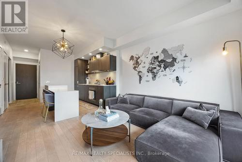 609 - 12 Bonnycastle Street, Toronto, ON - Indoor Photo Showing Living Room