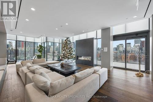 609 - 12 Bonnycastle Street, Toronto, ON - Indoor Photo Showing Living Room With Fireplace