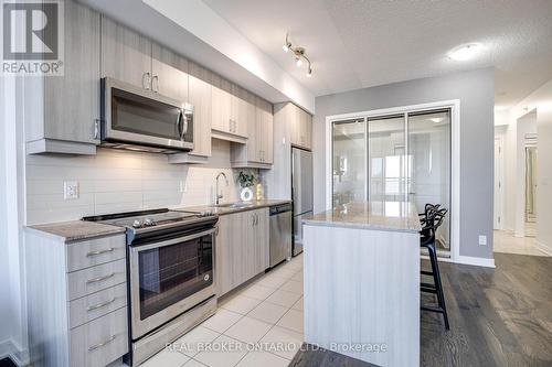 213 - 9201 Yonge Street, Richmond Hill, ON - Indoor Photo Showing Kitchen With Upgraded Kitchen