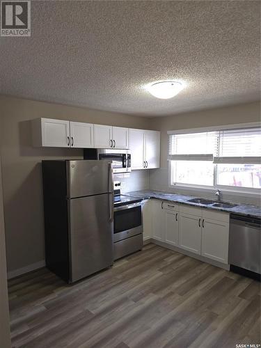 2121&2125 Rothwell Street, Regina, SK - Indoor Photo Showing Kitchen With Double Sink