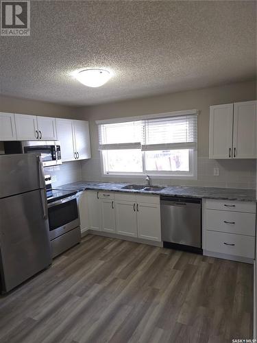 2121&2125 Rothwell Street, Regina, SK - Indoor Photo Showing Kitchen With Double Sink