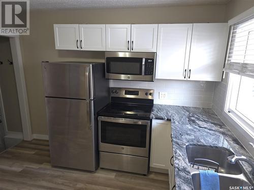 2121&2125 Rothwell Street, Regina, SK - Indoor Photo Showing Kitchen With Double Sink