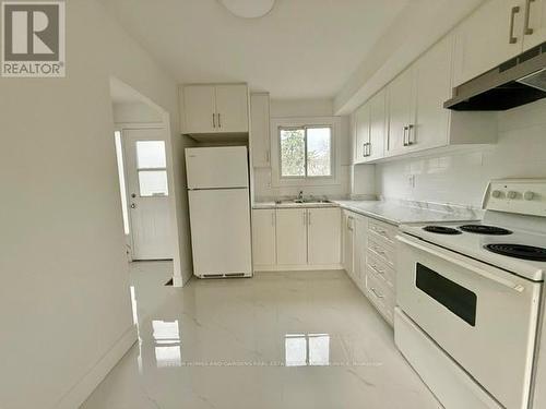 124 - 17 Old Pine Trail, St. Catharines, ON - Indoor Photo Showing Kitchen With Double Sink