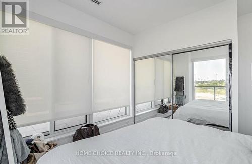 709 - 30 Shore Breeze Drive, Toronto, ON - Indoor Photo Showing Bedroom