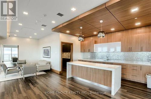 709 - 30 Shore Breeze Drive, Toronto, ON - Indoor Photo Showing Kitchen With Upgraded Kitchen