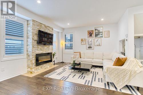 67 Padua Crescent, Hamilton, ON - Indoor Photo Showing Living Room With Fireplace