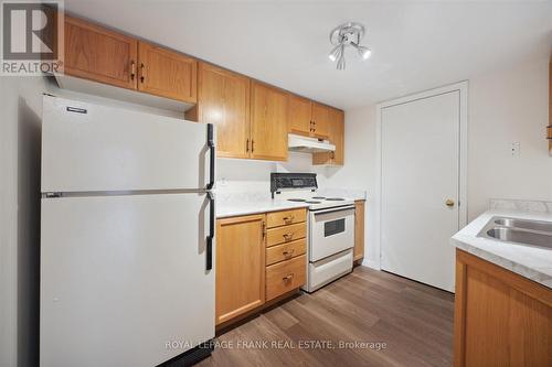 114 - 95 Wellington Street, Clarington (Bowmanville), ON - Indoor Photo Showing Kitchen With Double Sink