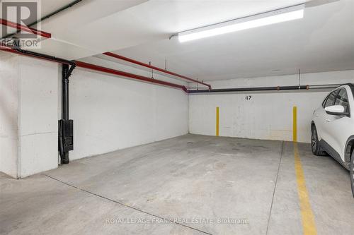 114 - 95 Wellington Street, Clarington (Bowmanville), ON - Indoor Photo Showing Garage