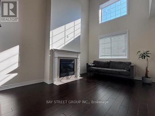 647 Murray Meadows Place, Milton, ON - Indoor Photo Showing Living Room With Fireplace