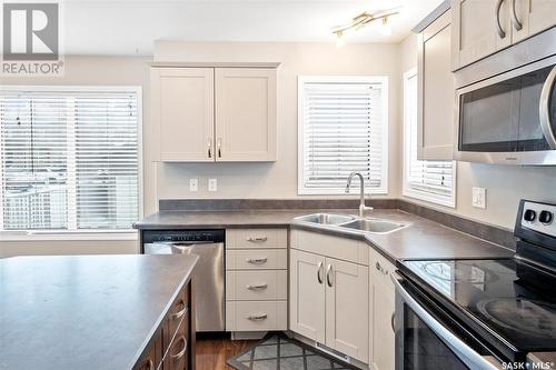 103 Denham Crescent, Saskatoon, SK - Indoor Photo Showing Kitchen With Double Sink