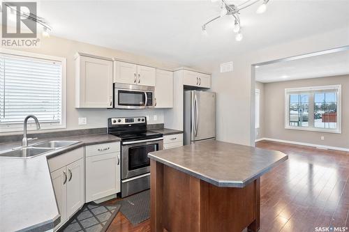 103 Denham Crescent, Saskatoon, SK - Indoor Photo Showing Kitchen With Double Sink