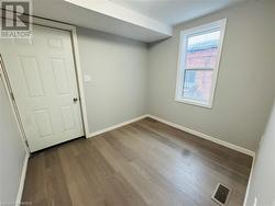 Unfurnished room featuring light hardwood / wood-style flooring - 