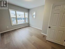 Spare room featuring light hardwood / wood-style flooring - 