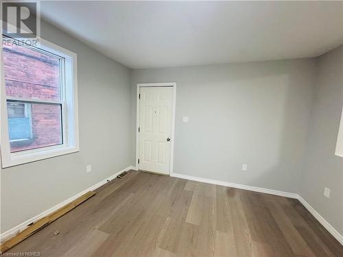 Spare room with light wood-type flooring - 472 First Ave W, North Bay, ON - Indoor Photo Showing Other Room