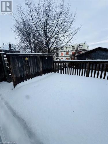 View of yard covered in snow - 472 First Ave W, North Bay, ON - Outdoor