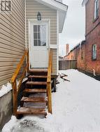 View of snow covered property entrance - 