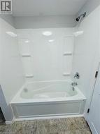 Bathroom with tub / shower combination - 