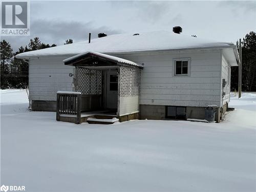 View of snow covered back of property - 32299 Highway 17 E, Deep River, ON - Outdoor With Exterior