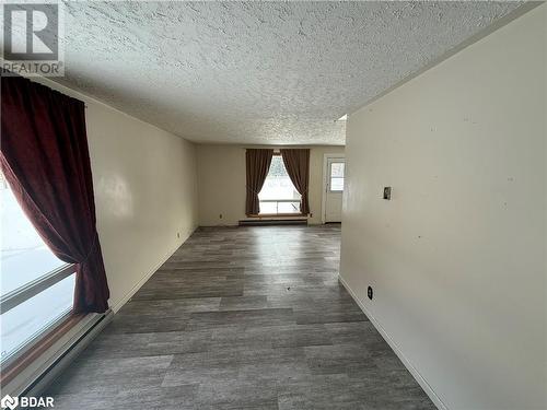 Spare room with a textured ceiling - 32299 Highway 17 E, Deep River, ON - Indoor Photo Showing Other Room