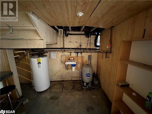 Utility room with water heater - 32299 Highway 17 E, Deep River, ON - Indoor Photo Showing Basement