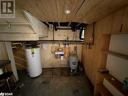 Utility room with water heater - 