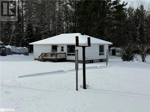 View of front facade with a deck - 32299 Highway 17 E, Deep River, ON - Outdoor