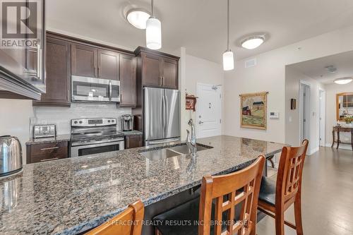 112 - 740 Augusta Drive, Kingston (City Northwest), ON - Indoor Photo Showing Kitchen With Stainless Steel Kitchen With Double Sink With Upgraded Kitchen