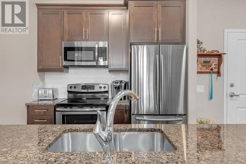 112 - 740 Augusta Drive, Kingston (City Northwest), ON - Indoor Photo Showing Kitchen With Stainless Steel Kitchen With Double Sink With Upgraded Kitchen