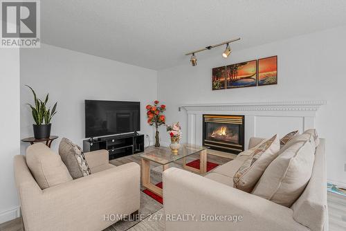 203 Somerville Street, Tecumseh, ON - Indoor Photo Showing Living Room With Fireplace