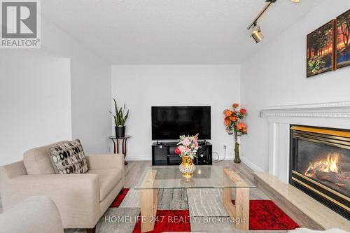 203 Somerville Street, Tecumseh, ON - Indoor Photo Showing Living Room With Fireplace