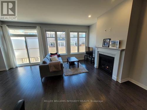 699 Taliesin Crescent, Ottawa, ON - Indoor Photo Showing Living Room With Fireplace