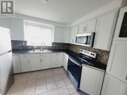 48 St Andrews Court, Aurora, ON - Indoor Photo Showing Kitchen With Double Sink