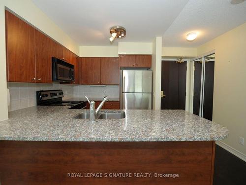 509-30 Grand Trunk Crescent, Toronto, ON - Indoor Photo Showing Kitchen With Double Sink