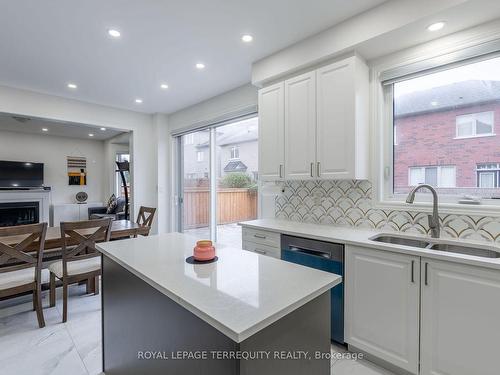 10 Schoolbridge St, Ajax, ON - Indoor Photo Showing Kitchen With Fireplace With Double Sink