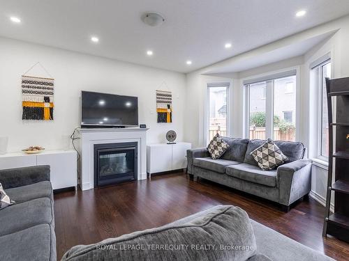 10 Schoolbridge St, Ajax, ON - Indoor Photo Showing Living Room With Fireplace