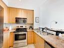 2308-220 Burnhamthrope Rd, Mississauga, ON  - Indoor Photo Showing Kitchen With Double Sink 