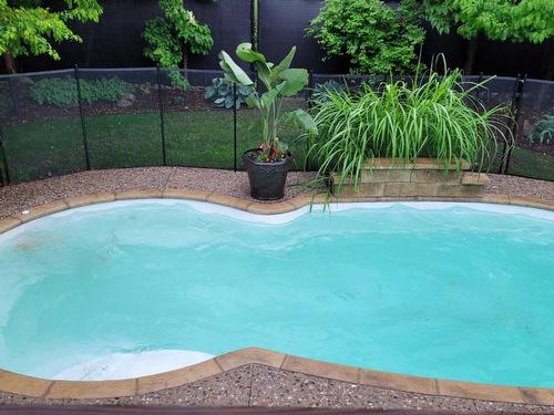 Piscine - 1124 Rue De Gibraltar, Laval (Fabreville), QC - Outdoor With In Ground Pool With Backyard