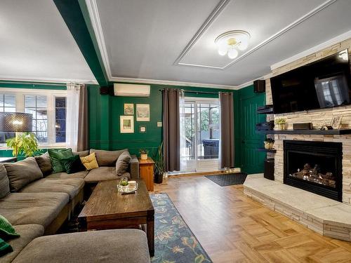 Salon - 1124 Rue De Gibraltar, Laval (Fabreville), QC - Indoor Photo Showing Living Room With Fireplace