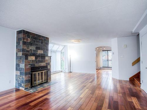 Salon - 155 Rue Terry-Fox, Montréal (Verdun/Île-Des-Soeurs), QC - Indoor Photo Showing Living Room With Fireplace