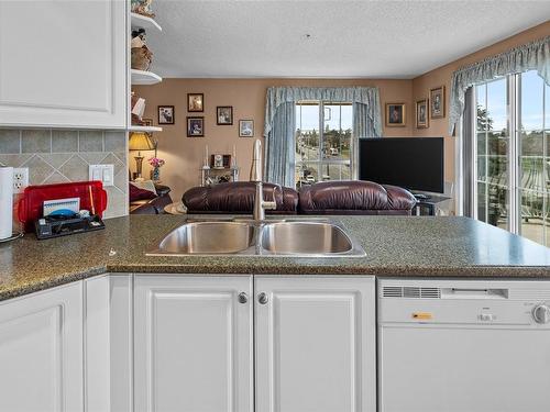 304-3133 Tillicum Rd, Saanich, BC - Indoor Photo Showing Kitchen With Double Sink