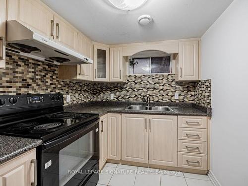 Bsmt-11 Thornbeck Dr, Toronto, ON - Indoor Photo Showing Kitchen With Double Sink