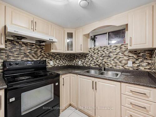 Bsmt-11 Thornbeck Dr, Toronto, ON - Indoor Photo Showing Kitchen With Double Sink