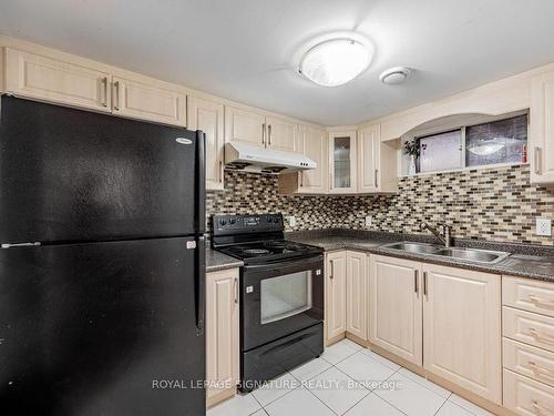 Bsmt-11 Thornbeck Dr, Toronto, ON - Indoor Photo Showing Kitchen With Double Sink