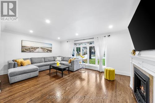 38 Citation Drive, Toronto, ON - Indoor Photo Showing Living Room With Fireplace