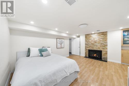 38 Citation Drive, Toronto, ON - Indoor Photo Showing Bedroom With Fireplace