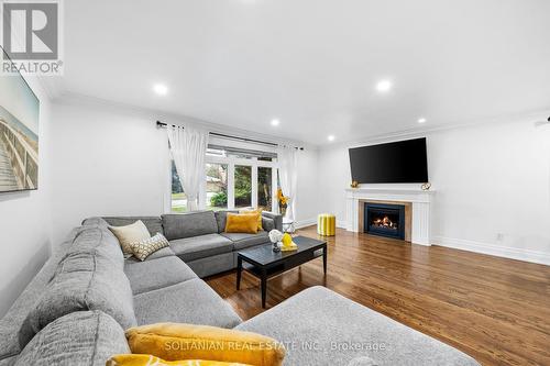 38 Citation Drive, Toronto, ON - Indoor Photo Showing Living Room With Fireplace