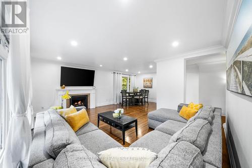 38 Citation Drive, Toronto, ON - Indoor Photo Showing Living Room With Fireplace