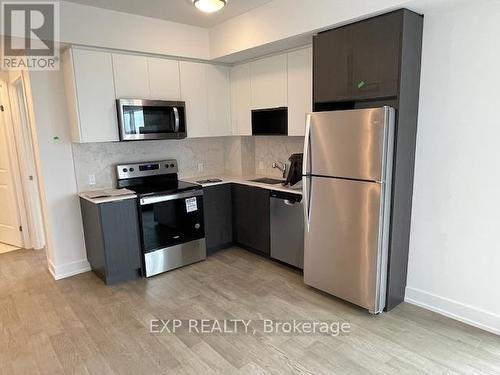 2107 - 202 Burnhamthorpe Road E, Mississauga, ON - Indoor Photo Showing Kitchen With Stainless Steel Kitchen