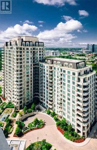 910 - 10 Bloorview Place, Toronto, ON - Outdoor With Balcony With Facade