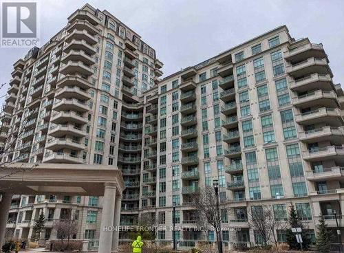 910 - 10 Bloorview Place, Toronto, ON - Outdoor With Balcony With Facade